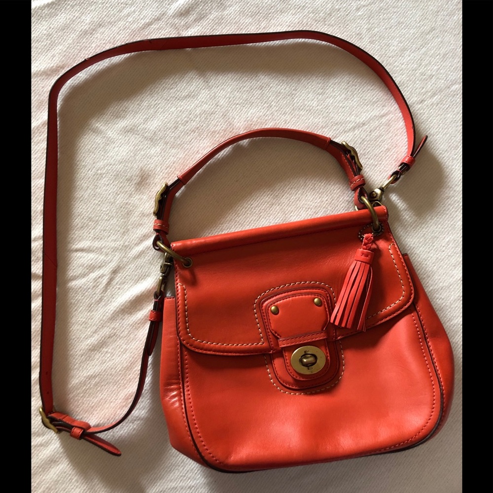orange Coach crossbody/top handle bag